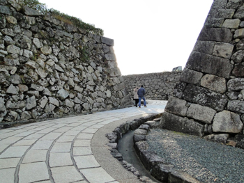 The thick stone walls of Sasayama Castle