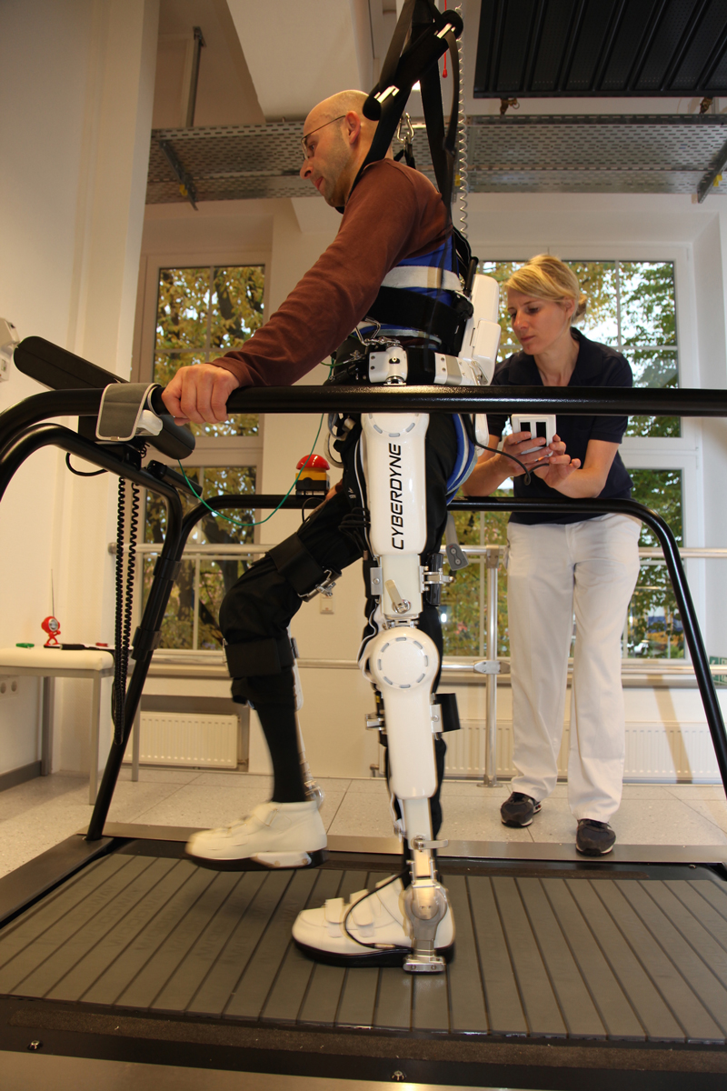 A man uses the Robot Suit HAL developed by Cyberdyne Inc. for rehabilitation in Germany. | PROF. SANKAI, UNIVERSITY OF TSUKUBA/CYBERDYNE INC.